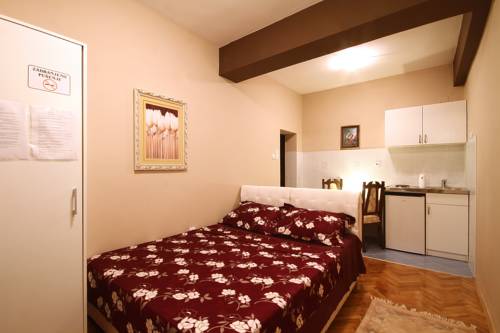 Imagen de la habitación del Hotel Apartments Vila Galileo. Foto 1