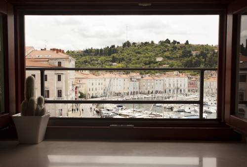 Imagen de la habitación del Hotel Apartments Vila Piranesi. Foto 7