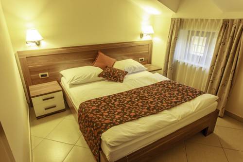 Imagen de la habitación del Hotel Apartments Vila Piranesi. Foto 8