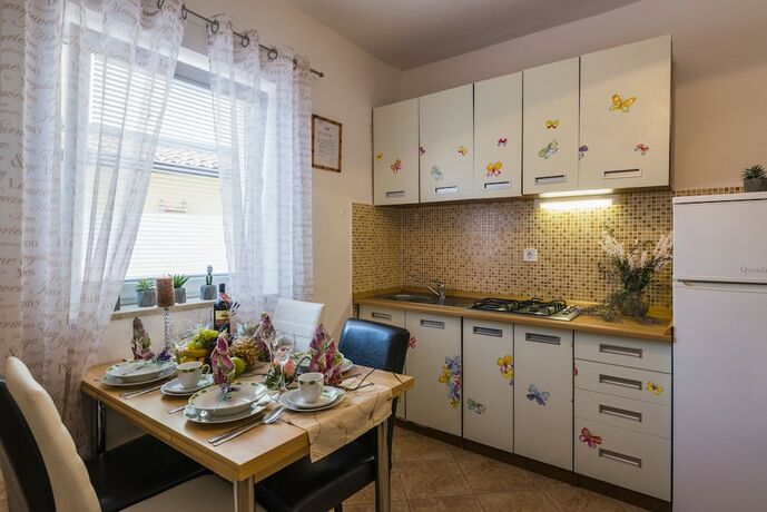 Imagen de la habitación del Hotel Apartments Villa Nona. Foto 12