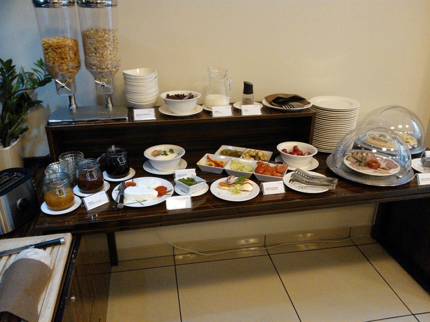 Imagen del bar/restaurante del Hotel Apartments Zgoda Warszawa By Desilva. Foto 2