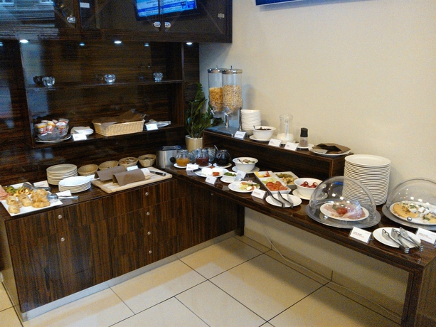 Imagen del bar/restaurante del Hotel Apartments Zgoda Warszawa By Desilva. Foto 7