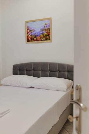 Imagen de la habitación del Hotel Apartments and Rooms Armanda. Foto 11