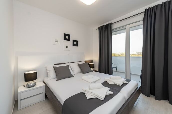 Imagen de la habitación del Hotel Apartments and Rooms Pool Villas Maris. Foto 13