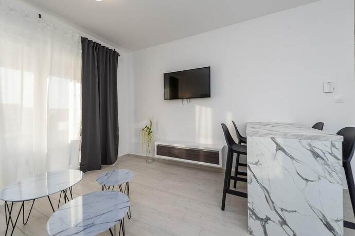 Imagen de la habitación del Hotel Apartments and Rooms Pool Villas Maris. Foto 16