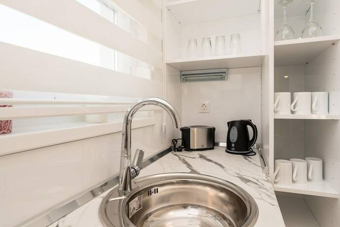 Imagen general del Hotel Apartments and Rooms Pool Villas Maris. Foto 7