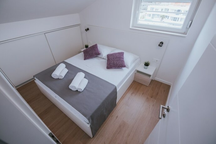 Imagen de la habitación del Hotel Apartments and Rooms Villa Casia. Foto 11