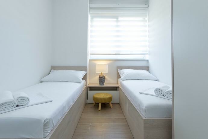 Imagen de la habitación del Hotel Apartments and Rooms Villa Casia. Foto 12