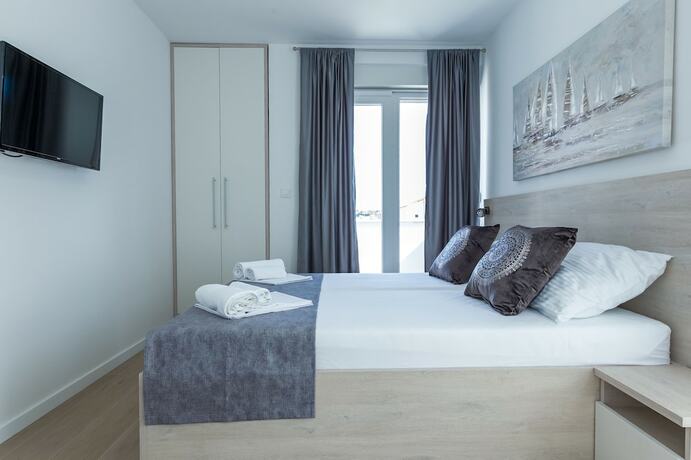 Imagen de la habitación del Hotel Apartments and Rooms Villa Casia. Foto 13