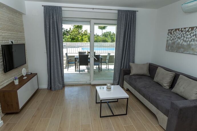 Imagen de la habitación del Hotel Apartments and Rooms Villa Casia. Foto 17