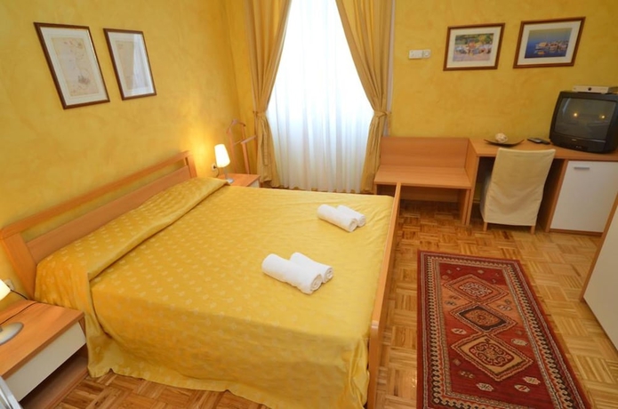 Imagen de la habitación del Hotel Apartments and Rooms Villa Rossella 2. Foto 4