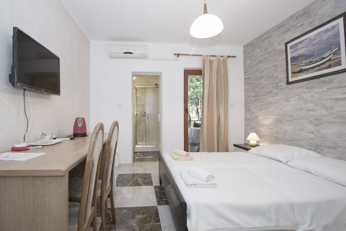 Imagen de la habitación del Hotel Apartments and rooms Eugenia. Foto 19