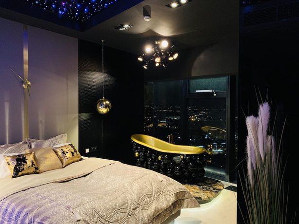Imagen de la habitación del Hotel Apartments in Sky Tower with Bathtub near the window. Foto 11