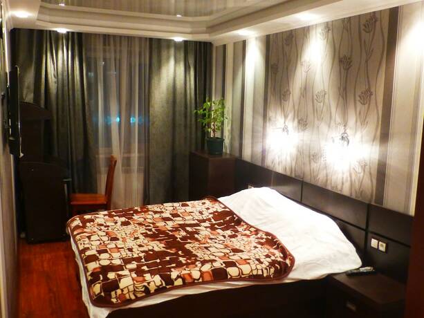 Imagen de la habitación del Hotel Apartments on Tolstogo 1. Foto 16