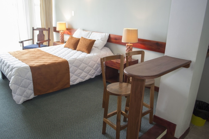 Imagen de la habitación del Hotel Apartotel Tairona. Foto 8