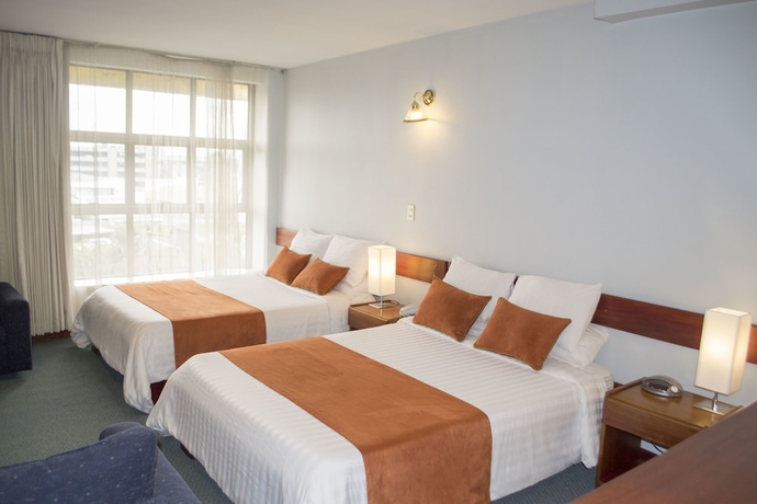 Imagen de la habitación del Hotel Apartotel Tairona. Foto 11