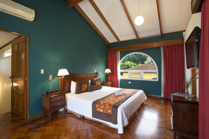 Imagen de la habitación del Hotel Apartotel and Suites Villas Del Rio. Foto 11