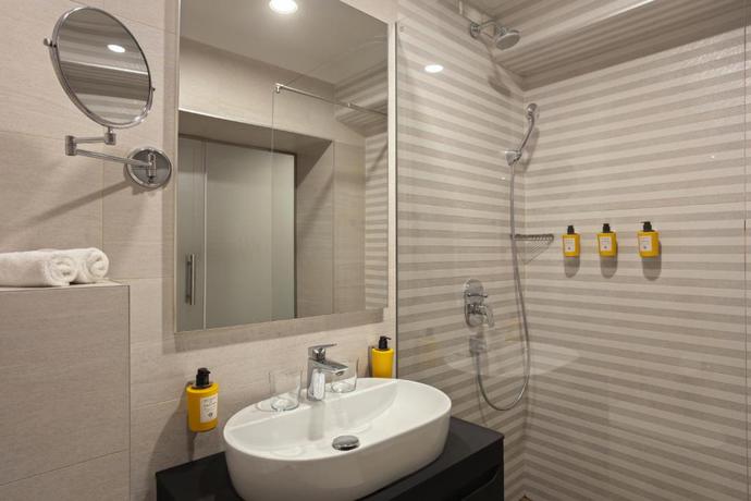 Imagen de la habitación del Hotel Apeiro City Avant-garde. Foto 14
