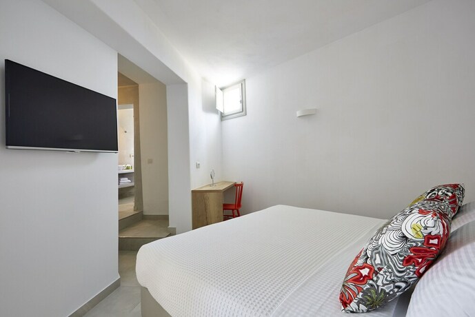 Imagen de la habitación del Hotel Aperanto Suites. Foto 13