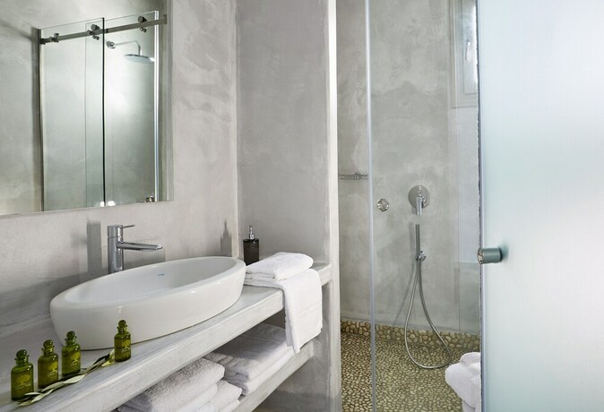 Imagen de la habitación del Hotel Aperanto Suites. Foto 21