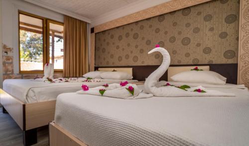Imagen de la habitación del Hotel Aperion Beach Side. Foto 19