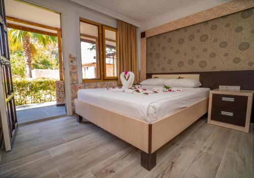 Imagen de la habitación del Hotel Aperion Beach Side. Foto 20