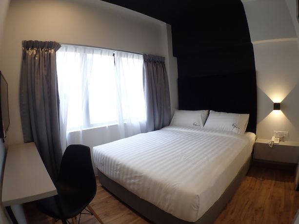 Imagen de la habitación del Hotel Apex Boutique. Foto 13