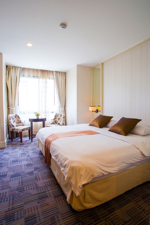 Imagen de la habitación del Hotel Aphrodite Inn Bangkok. Foto 5