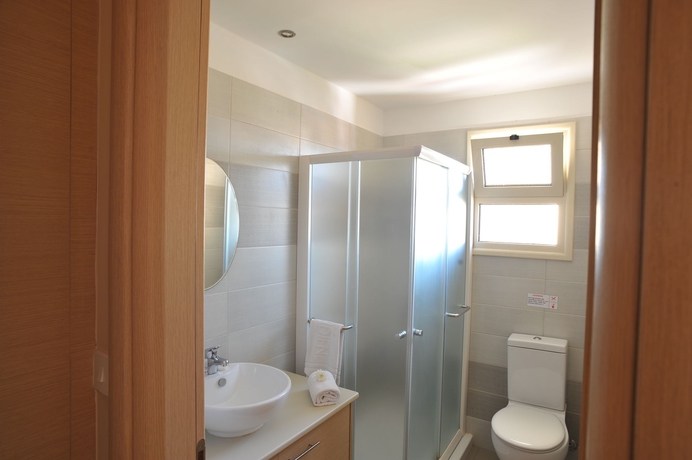 Imagen de la habitación del Hotel Aphrodite Sands Resort. Foto 8