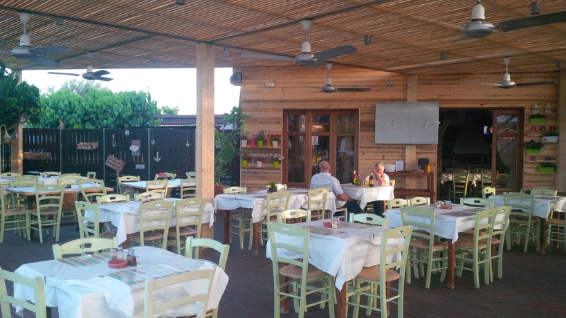 Imagen del bar/restaurante del Hotel Aphrodite Sands Resort. Foto 3