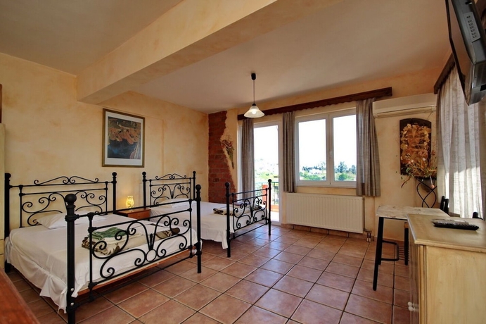 Imagen de la habitación del Hotel Aphrodites Studios. Foto 5