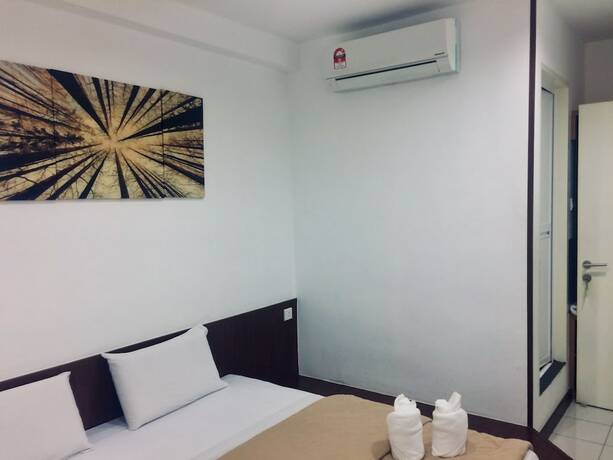 Imagen de la habitación del Hotel Api-Api Guest House. Foto 19