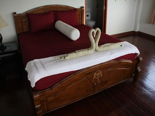 Imagen de la habitación del Hotel Apichada Villa. Foto 21
