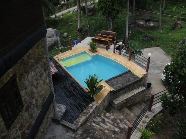 Imagen de la habitación del Hotel Apichada Villa. Foto 25