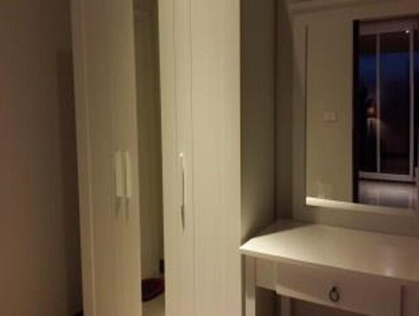 Imagen de la habitación del Hotel Apichada Villa. Foto 31