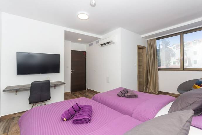 Imagen de la habitación del Hotel Apinelo Tower Rooms. Foto 19