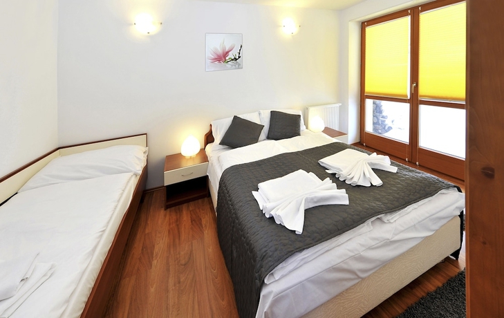 Imagen de la habitación del Hotel Aplend Vila Magnolia. Foto 5