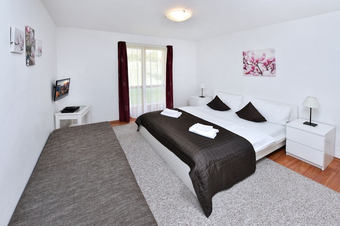 Imagen de la habitación del Hotel Aplend Vila Magnolia. Foto 8