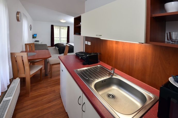 Imagen de la habitación del Hotel Aplend Vila Magnolia. Foto 15