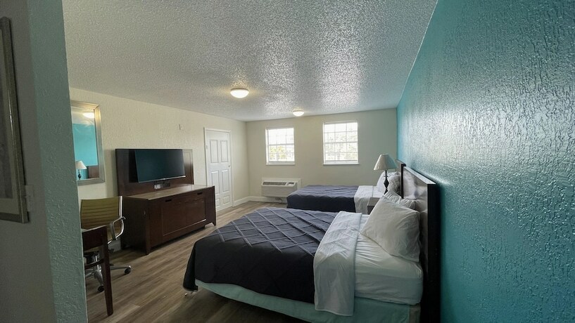 Imagen de la habitación del Hotel Apm Inn And Suite. Foto 11