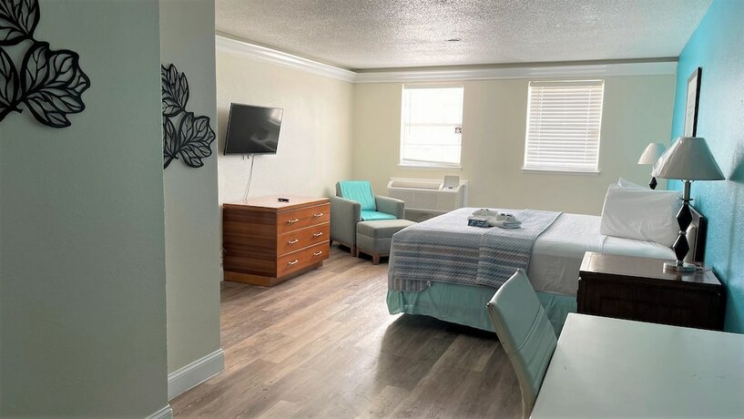 Imagen de la habitación del Hotel Apm Inn And Suite. Foto 14