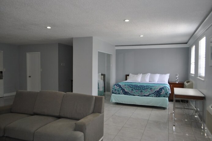 Imagen de la habitación del Hotel Apm Inn And Suite. Foto 17