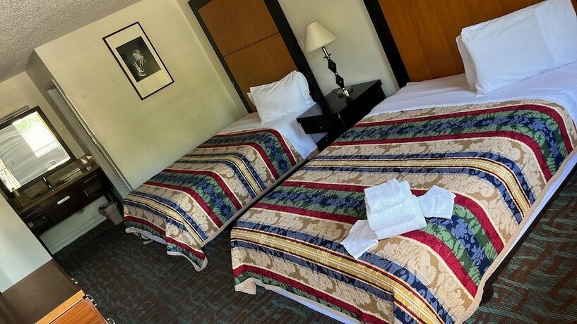 Imagen de la habitación del Hotel Apm Inn And Suite. Foto 18