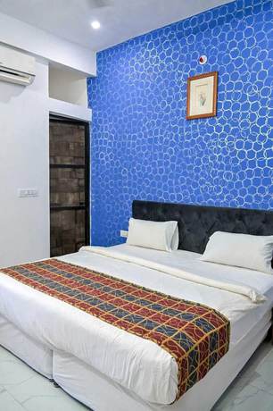 Imagen de la habitación del Hotel Apni Haveli Villa. Foto 4