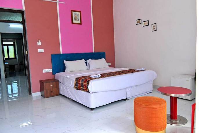 Imagen de la habitación del Hotel Apni Haveli Villa. Foto 6