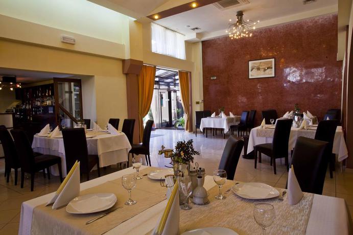 Imagen del bar/restaurante del Hotel Apollo Central. Foto 6