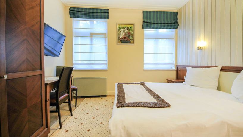 Imagen de la habitación del Hotel Apollo, Darlowo. Foto 14