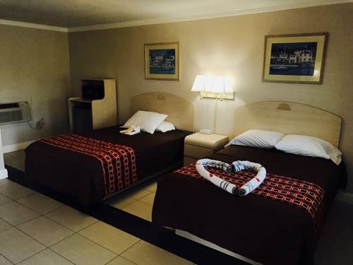 Imagen de la habitación del Hotel Apollo Inn Motel. Foto 7