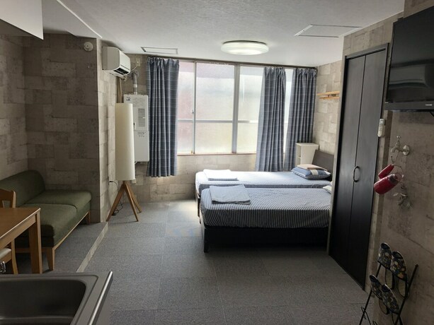 Imagen de la habitación del Hotel Apollo Properties. Foto 19