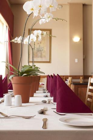 Imagen del bar/restaurante del Hotel Apollo, Randburg. Foto 2